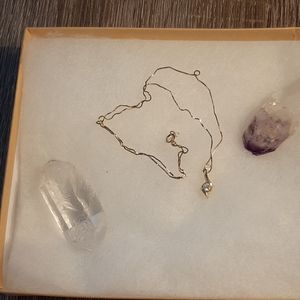 10K YG with 1/4K diamond solitaire pendant.